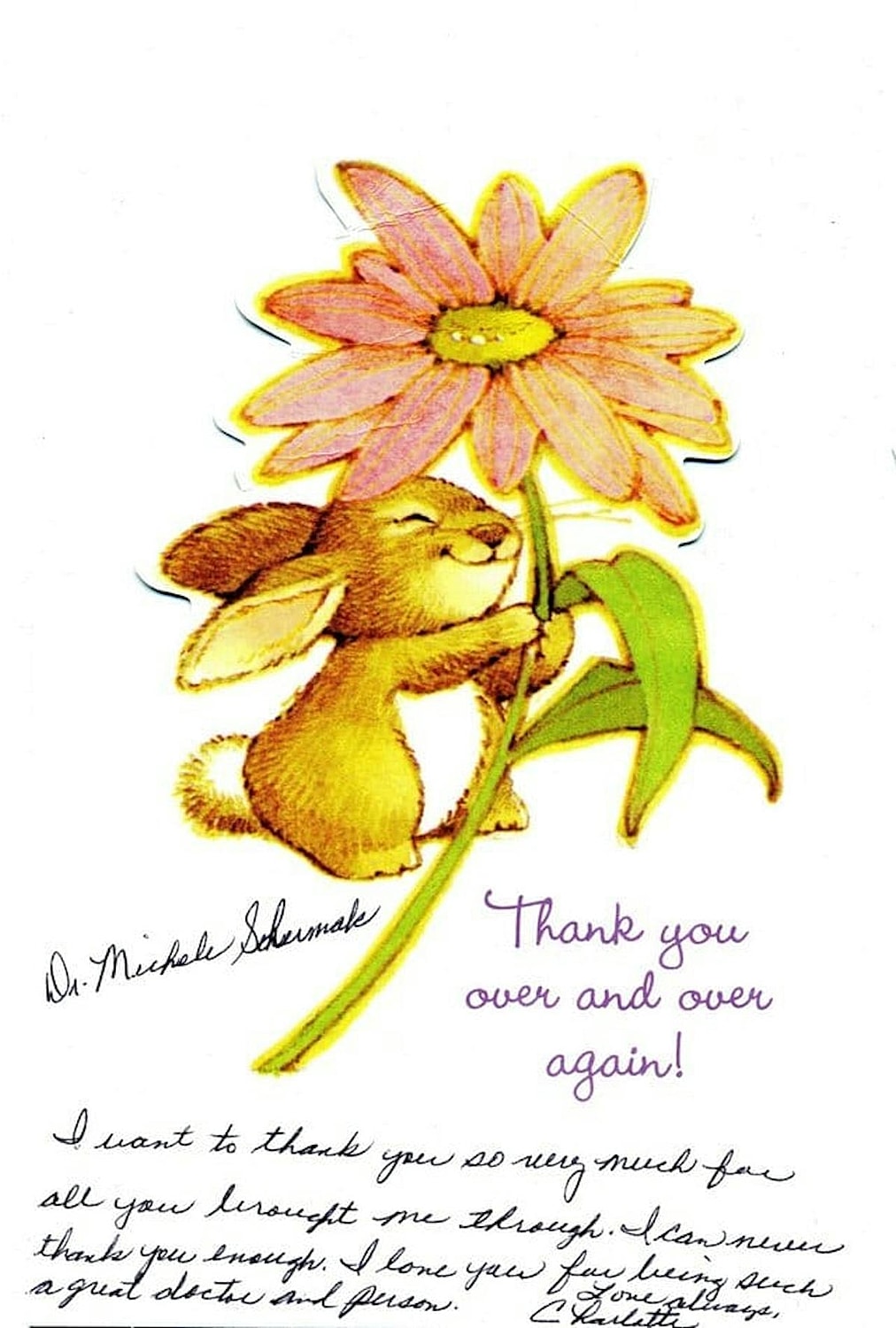 Cute bunny holding a flower with gratitude message.