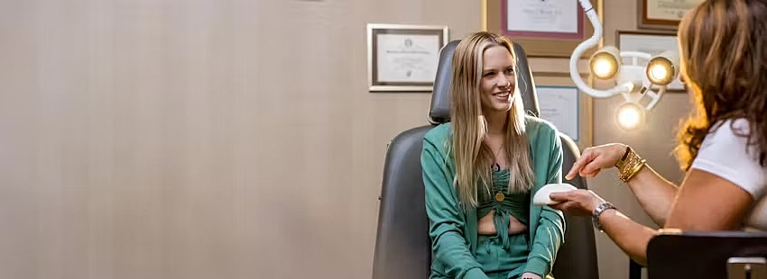 Patient consultation in a medical office setting.
