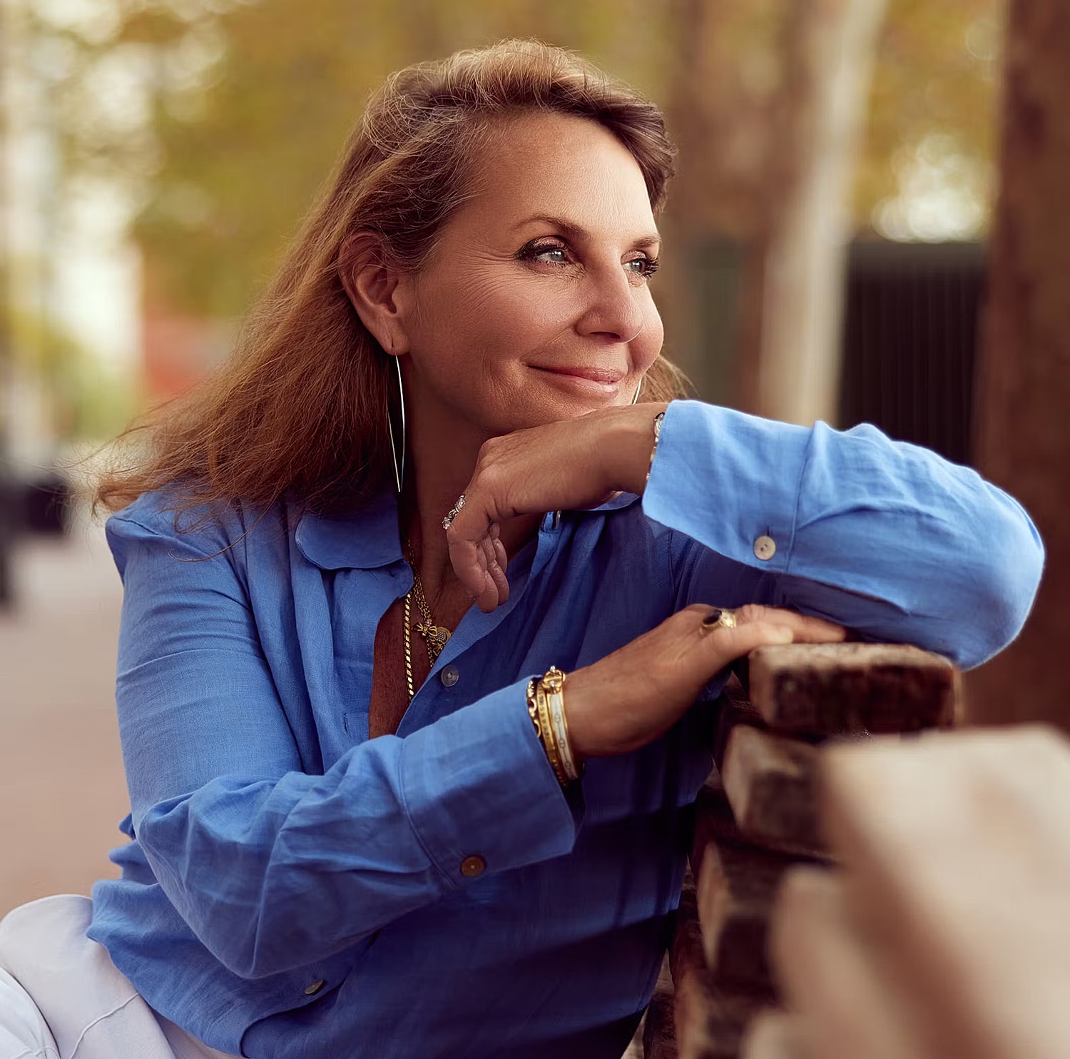 Model in brown swimwear posing confidently.