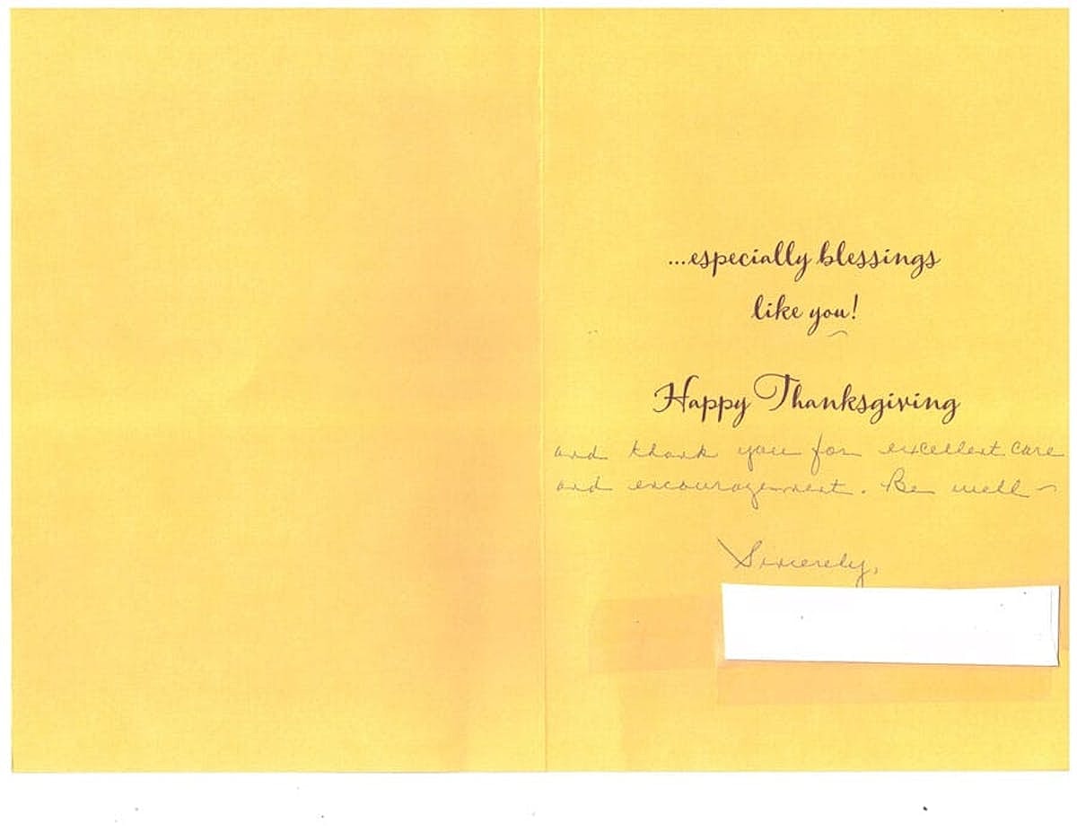 Thanksgiving card with handwritten message and blessings.
