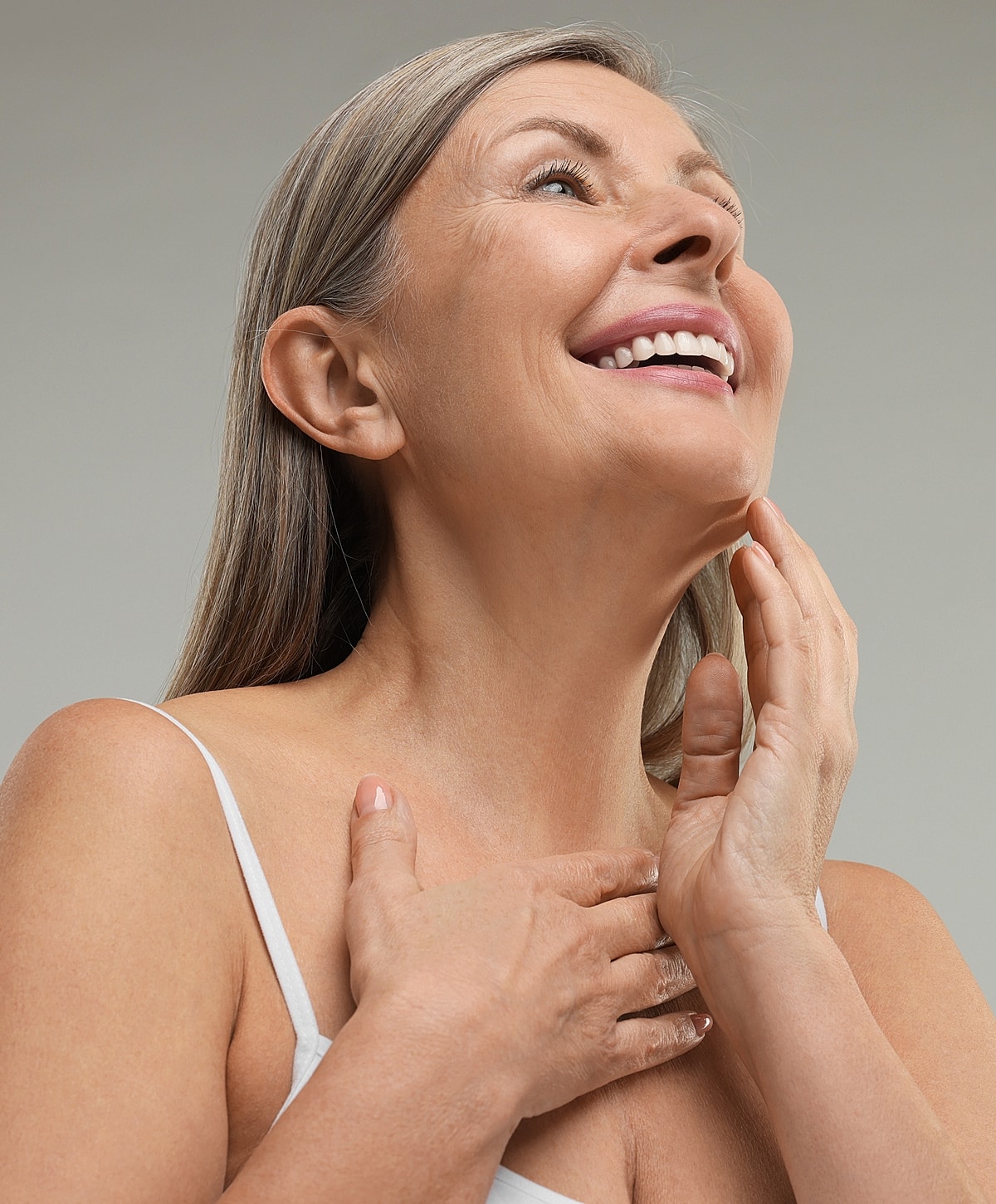 Model in brown swimwear posing confidently.