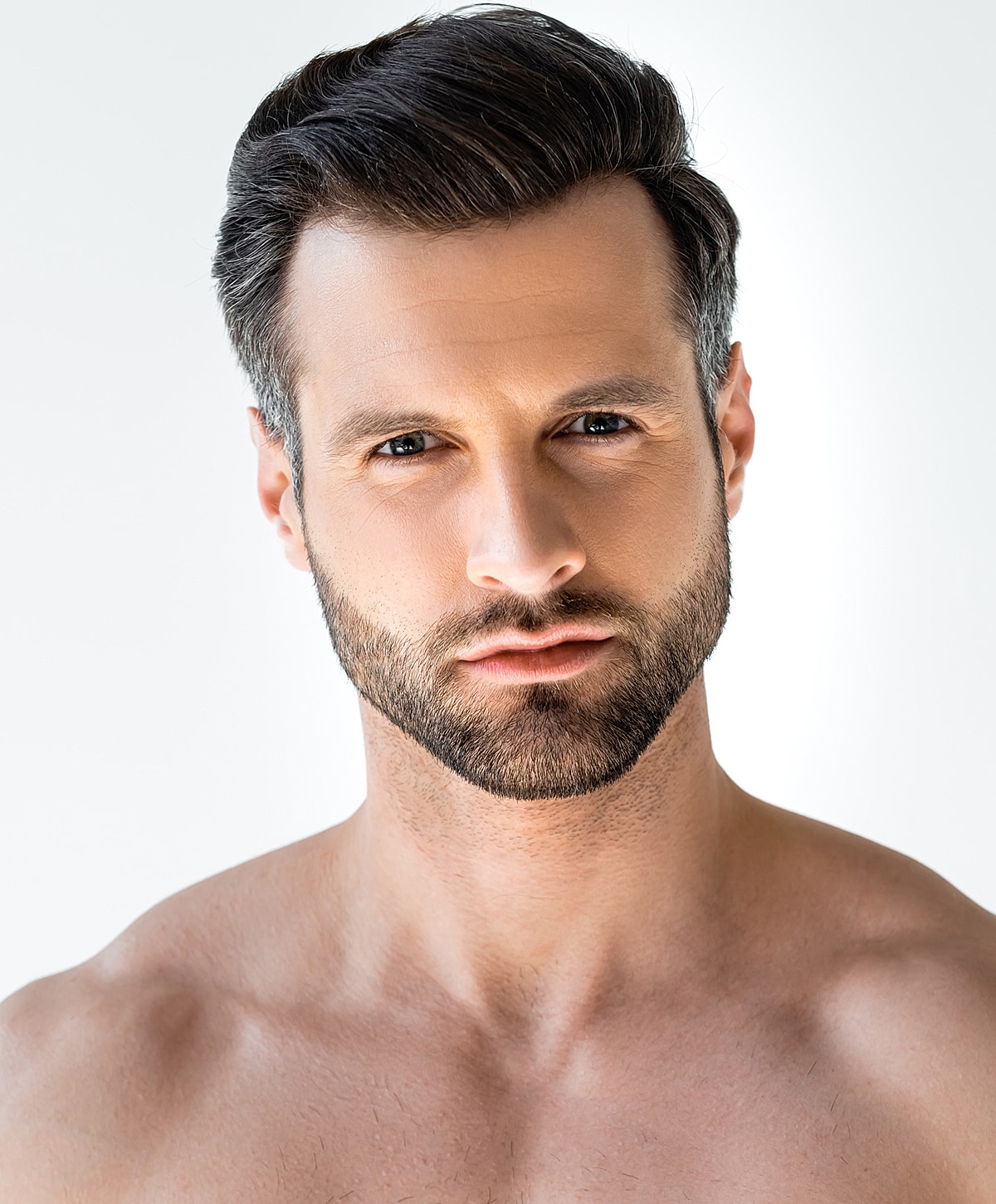 Model in brown swimwear posing confidently.
