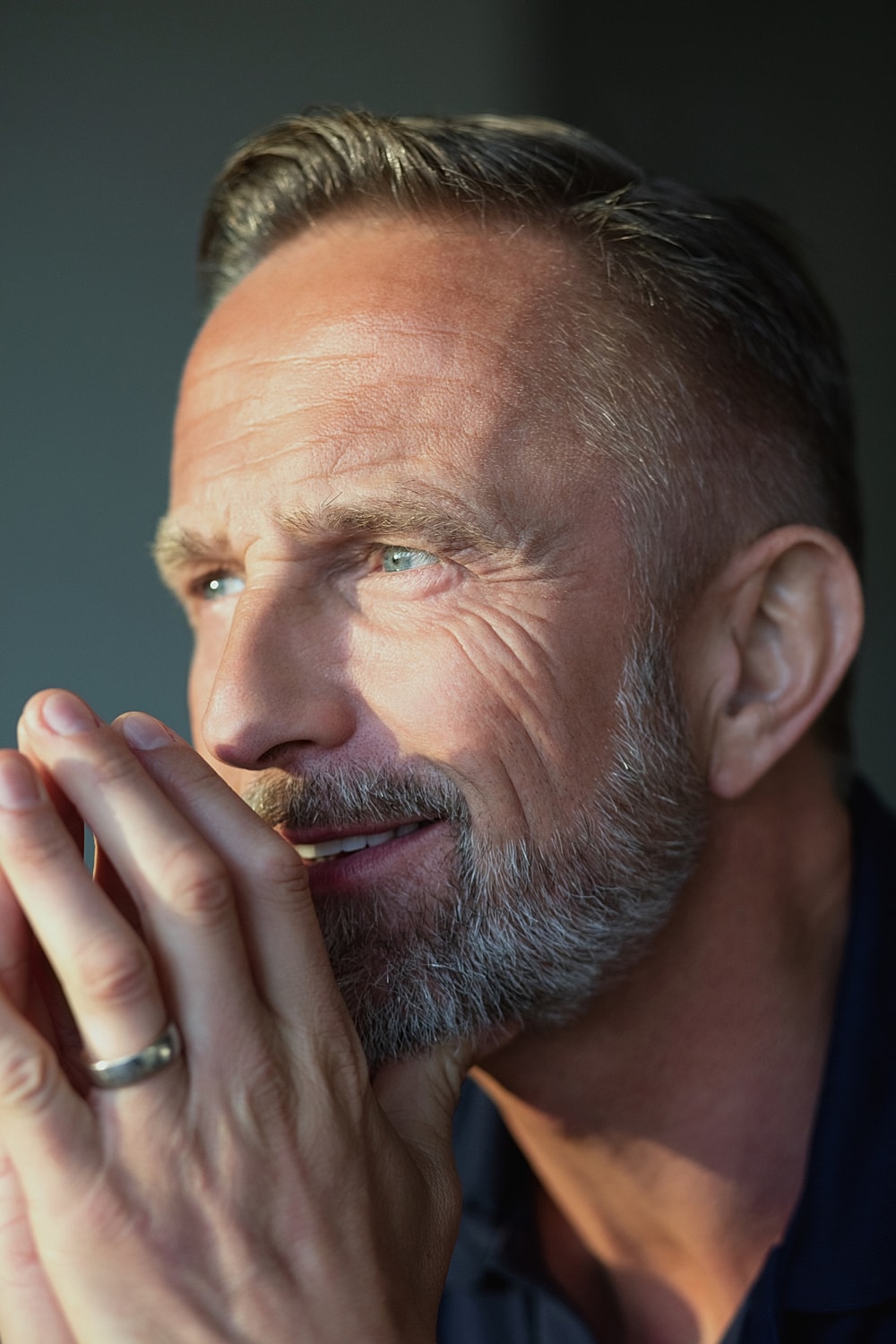Model in brown swimwear posing confidently.