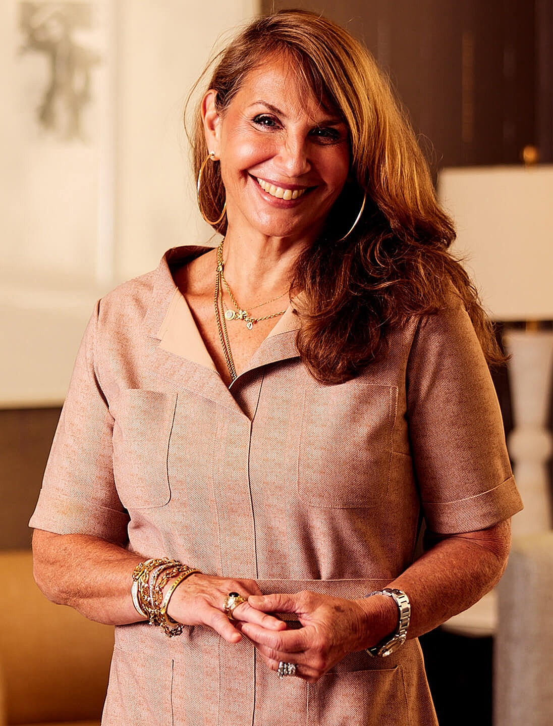 Model in brown swimwear posing confidently.