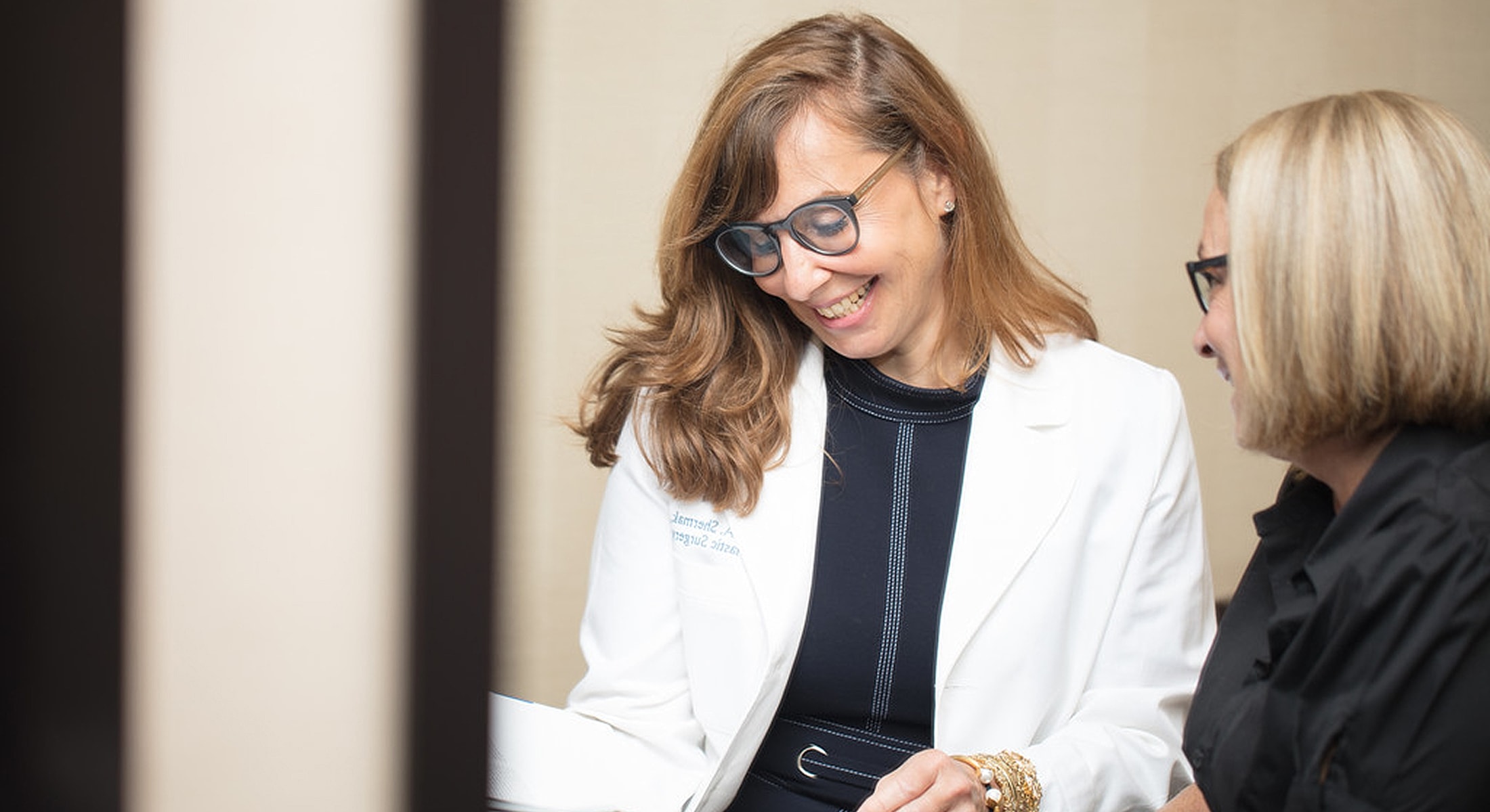 Doctor consulting with a patient in a clinic.